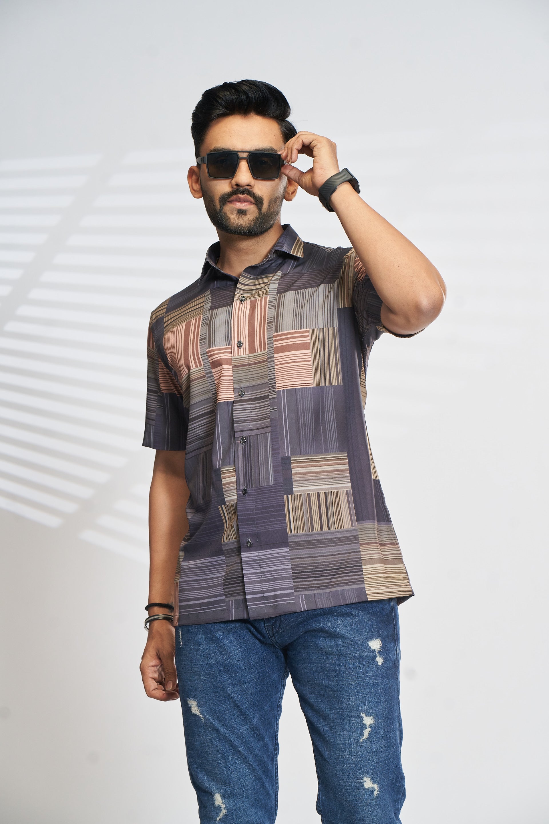 Mensoline Cotton Blend Casual Shirt for Men – Navy Blue Abstract Stripe Design.